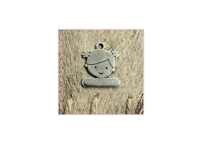 Colgante niña 23 x 28 mm...